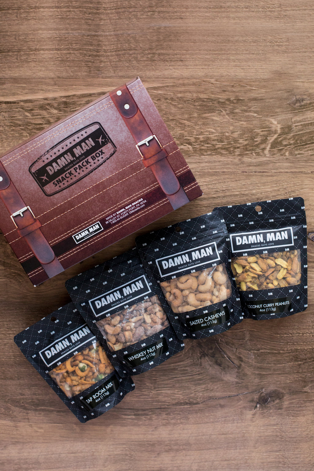 Build Your Own 4-Pack Box Mixed Nuts snack gifts for men by Damn, Man Snacks on wooden table