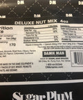 Nutrition facts label of Damn, Man Deluxe Nut Mix 4 oz package showing calories, ingredients, and other nutritional information.