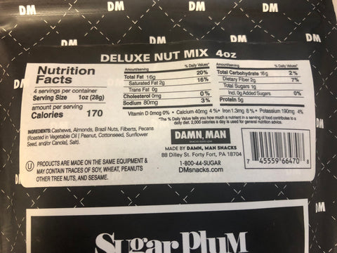 Nutrition facts label of Damn, Man Deluxe Nut Mix 4 oz package showing calories, ingredients, and other nutritional information.