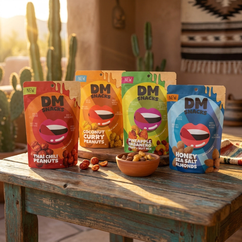 Four colorful DM Snacks Happy Nuts bags
